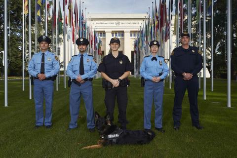 Members of the United Nations security forces pose in front of the U.N. European headquarters in Geneva, October 20, 2014. PHOTO BY REUTERS/Denis Balibouse