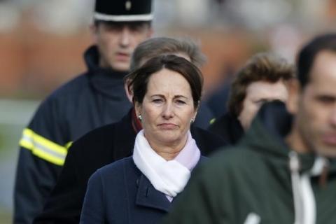 French Minister for Ecology, Sustainable Development and Energy Segolene Royal arrives at the scene near the wreckage of a school minibus after it crashed into a metal panel which fell from a truck in Rochefort, France, February 11, 2016. PHOTO BY REUTERS/Regis Duvignau