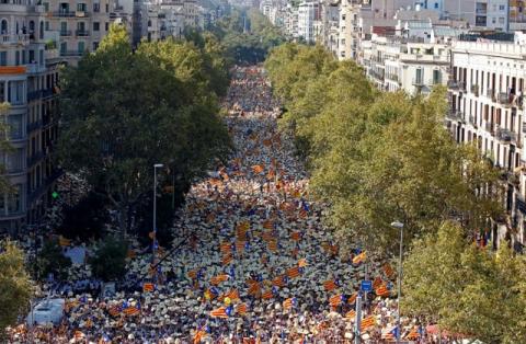 People hold Catalan separatist flags known as "Esteladas" during a gathering to mark the Catalonia day "Diada" in central Barcelona, Spain, September 11, 2016. PHOTO BY REUTERS/Albert Gea