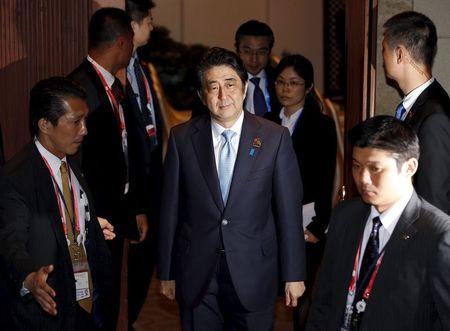 Japanese Prime Minister Shinzo Abe leaves a meeting with Chinese President Xi Jinping on the sidelines of the Asian-African Conference in Jakarta April 22, 2015. REUTERS/Darren Whiteside
