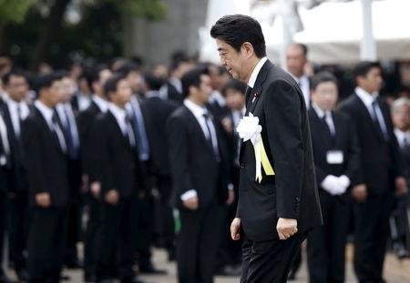 Japan's Prime Minister Shinzo Abe attends a ceremony commemorating the 70th anniversary of the 1945 atomic bombing of the city, at Nagasaki's Peace Park in Nagasaki, western Japan, August 9, 2015. PHOTO BY REUTERS/Toru Hanai