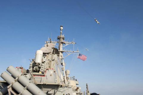 An U.S. Navy picture shows what appears to be a Russian Sukhoi SU-24 attack aircraft flying over the USS Donald Cook in the Baltic Sea. PHOTO BY REUTERS/US Navy