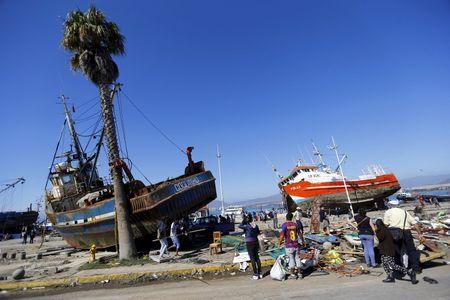 Ships are seen on the street after an earthquake hit areas of central Chile, in Coquimbo city, north of Santiago, Chile, September 17, 2015. PHOTO BY REUTERS/Ivan Alvarado