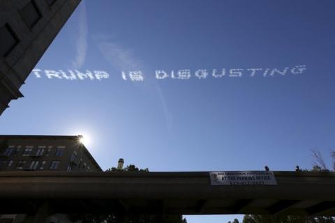 Skywriting over the 127th Rose Parade makes a reference to U.S. Republican presidential candidate Donald Trump, in Pasadena, California, January 1, 2016. PHOTO BY REUTERS/David McNew