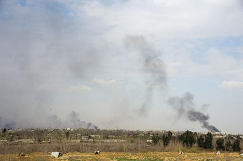 Smoke rises from eastern Ghouta in Damascus, Syria, March 10, 2018. PHOTO BY REUTERS/Sana