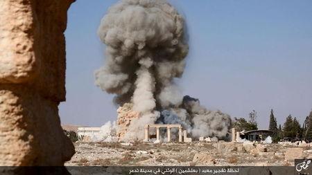 An image distributed by Islamic State militants on social media on August 25, 2015 purports to show the destruction of a Roman-era temple in the ancient Syrian city of Palmyra. PHOTO BY REUTERS/Social Media