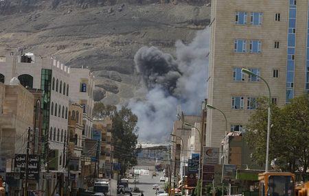 Smoke rises from the site of a Saudi-led air strike in Yemen's capital Sanaa September 18, 2015. PHOTO BY REUTERS/Khaled Abdullah