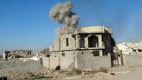 Smoke rises during an air strike in Ramadi city, December 26, 2015. PHOTO BY REUTERS/Stringer