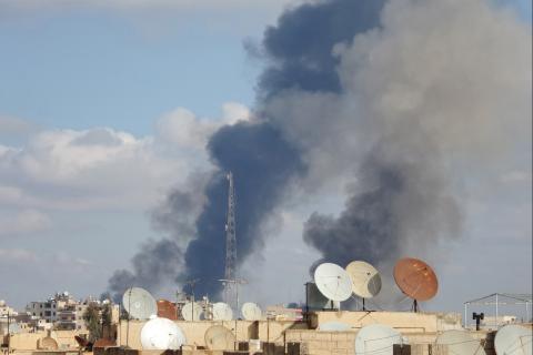 Smoke rises after what activists said were airstrikes by forces loyal to Syria's President Bashar al-Assad in Raqqa, eastern Syria, which is controlled by the Islamic State, November 25, 2014. PHOTO BY REUTERS/Nour Fourat