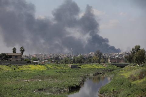 A smoke rises above Al-Nuri mosque in the old city as Iraqi forces fight Islamic State militants in Mosul, Iraq, April 17, 2017. PHOTO BY REUTERS/Marko Djurica