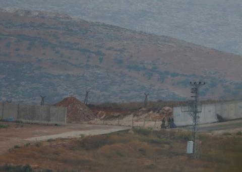 Turkish soldiers stand guard in front of a wall along the border between Turkey and Syria in Reyhanli, Hatay province, Turkey, October 13, 2017. PHOTO BY REUTERS/Osman Orsal