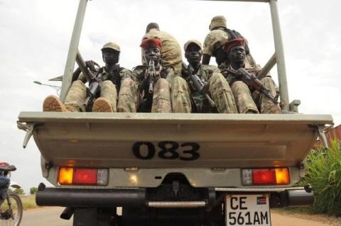 South Sudan National security members ride on their truck as they protect internally displaced people during a reallocation at the United Nations Mission in South Sudan (UNMISS) compound at the UN House in Jebel, in South Sudan's capital Juba, August 31, 2016. PHOTO BY REUTERS/Jok Solomun