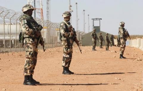 Algerian soldiers are seen at the Tiguentourine Gas Plant in In Amenas, 1600 km (994 miles) southeast of Algiers, January 31, 2013. PHOTO BY REUTERS/Louafi Larbi
