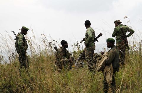 Soldiers from the Democratic Republic of Congo (DRC) take positions near its border with Rwanda after fighting broke out in eastern Congo