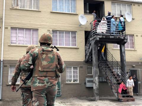 Soldiers patrol against gang violence in Manenberg township, Cape Town, South Africa, July 18, 2019. PHOTO BY REUTERS/Shafiek Tassiem