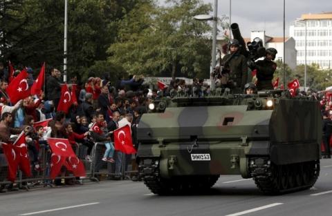 Turkish soldiers in an armored army vehicle take part in a Republic Day ceremony in Istanbul, Turkey, October 29, 2015. PHOTO BY REUTERS/Murad Sezer