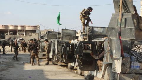 Iraqi security forces gather to advance towards the center of Ramadi city, December 24, 2015. PHOTO BY REUTERS/Stringer