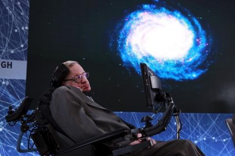 Physicist Stephen Hawking sits on stage during an announcement of the Breakthrough Starshot initiative with investor Yuri Milner in New York, April 12, 2016. PHOTO BY REUTERS/Lucas Jackson