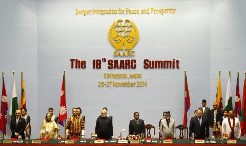 (Front L-R) Afghanistan's President Ashraf Ghani, Bangladesh's Prime Minister Sheikh Hasina, Bhutan's Prime Minister Tshering Tobgay, India's Prime Minister Narendra Modi, Maldives' President Abdulla Yameen, Nepal's Prime Minister Sushil Koirala, Pakistan's Prime Minister Nawaz Sharif and Sri Lanka's President Mahinda Rajapaksa attend the opening session of 18th South Asian Association for Regional Cooperation (SAARC) summit in Kathmandu, November 26, 2014. PHOTO BY REUTERS/Narendra 