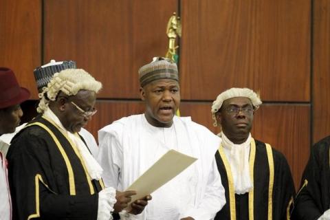 National Assembly Clerk Salisu Maikasuwa (L) swears in Rt. Hon Yakubu Dogara as the new Speaker of the House Of Representatives in Abuja, Nigeria, June 9, 2015. PHOTO BY REUTERS/Afolabi Sotunde