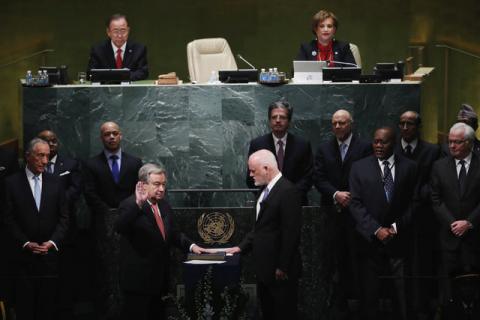 United Nations Secretary General Ban Ki-moon (back L) and Portugal's President Marcelo Rebelo de Sousa (L) watch as Secretary-General-designate Mr. Antonio Guterres of Portugal is sworn in by President of the UN General Assembly Peter Thomson (R) at UN headquarters in New York, U.S., December 12, 2016. PHOTO BY REUTERS/Lucas Jackson