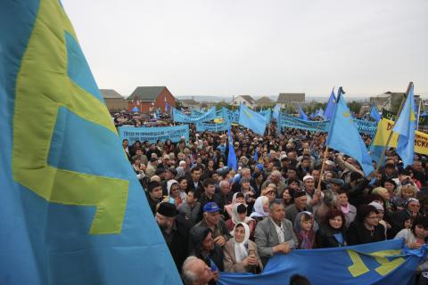 Crimean Tatars gather to commemorate the mass deportations from the region in 1944 during a rally in the Crimean capital Simferopol