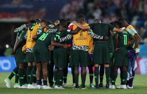 Nigeria players huddle after the match. PHOTO BY REUTERS/Ivan Alvarado
