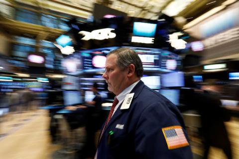 Traders work on the floor of the New York Stock Exchange (NYSE) in New York, U.S., February 7, 2017. PHOTO BY REUTERS/Brendan McDermid