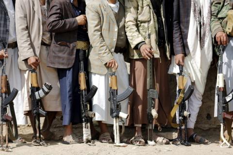 Tribesmen loyal to the Houthi movement hold their weapons at a gathering to show their support for the group, in Yemen's capital Sanaa, December 15, 2015. PHOTO BY REUTERS/Khaled Abdullah