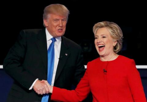 Donald Trump shakes hands with Hillary Clinton at the conclusion of their first presidential debate. PHOTO BY REUTERS/Mike Segar