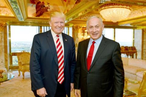Israeli Prime Minister Benjamin Netanyahu (R) stands next to Donald Trump during their meeting in New York, September 25, 2016. PHOTO BY REUTERS/Kobi Gideon
