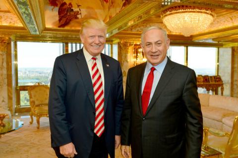 Israeli Prime Minister Benjamin Netanyahu (R) stands next to Republican U.S. presidential candidate Donald Trump during their meeting in New York, U.S., September 25, 2016. PHOTO BY REUTERS/Kobi Gideon Government Press Office (GPO)