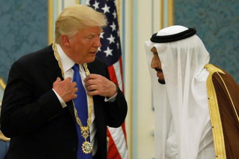 Saudi Arabia's King Salman bin Abdulaziz Al Saud (R) presents U.S. President Donald Trump with the Collar of Abdulaziz Al Saud Medal at the Royal Court in Riyadh, Saudi Arabia, May 20, 2017. PHOTO BY REUTERS/Jonathan Ernst