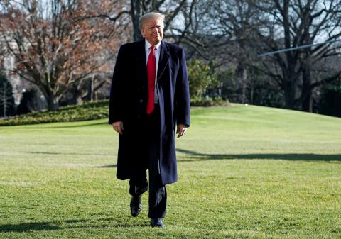 U.S. President Donald Trump walks before speaking to the media as he returns from Camp David to the White House in Washington, U.S., January 6, 2019. PHOTO BY REUTERS/Joshua Roberts