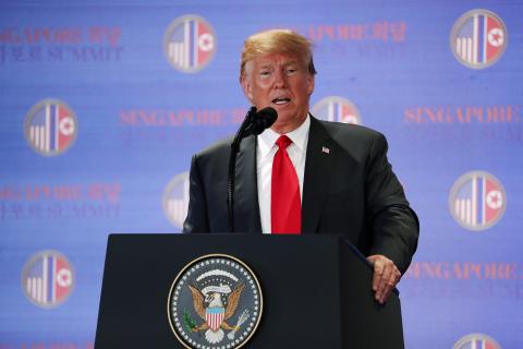 U.S. President Donald Trump speaks during a news conference after his meeting with North Korean leader Kim Jong Un at the Capella Hotel on Sentosa island in Singapore, June 12, 2018. PHOTO BY REUTERS/Jonathan Ernst