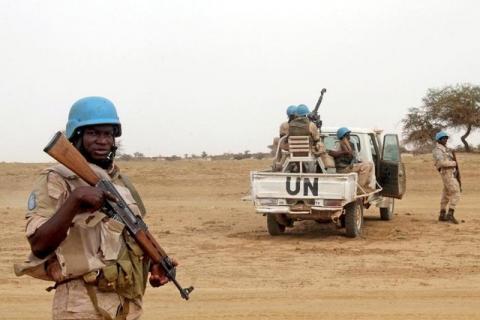 UN peacekeepers stand guard in the northern town of Kouroume, Mali, May 13, 2015. PHOTO BY REUTERS/Adama Diarra