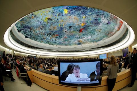 Delegates listens to the speech of new United Nations High Commissioner for Human Rights Michelle Bachelet during the Human Rights Council at the United Nations in Geneva, Switzerland, September 10, 2018. Picture taken with a fisheye lens. PHOTO BY REUTERS/Denis Balibouse