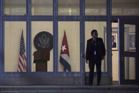 A man leaves the U.S. Embassy in Havana, Cuba August 13, 2015. U.S. Secretary of State John Kerry will arrive on Friday to formally re-designate the U.S. Interests Section as the U.S. Embassy in Havana. PHOTO BY REUTERS/Alexandre Meneghini
