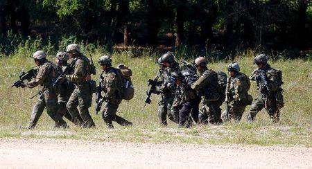 Soldiers take part in an exercise of the U.S. Army's Global Response Force in Hohenfels near Regensburg, August 26, 2015. PHOTO BY REUTERS/Michael Dalder
