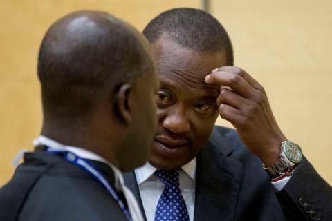 Kenya's President Uhuru Kenyatta (R) appears before the International Criminal Court in The Hague, October 8, 2014. PHOTO BY REUTERS/Peter Dejong
