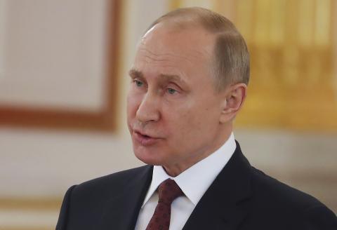 Russian President Vladimir Putin speaks during a ceremony to receive credentials from foreign ambassadors at the Kremlin in Moscow, Russia, April 11, 2018. PHOTO BY REUTERS/Sergei Ilnitsky