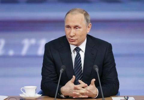 Russian President Vladimir Putin speaks during his annual end-of-year news conference in Moscow, Russia, December 17, 2015. PHOTO BY REUTERS/Maxim Zmeyev