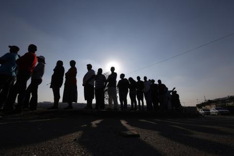 Voters queue to cast their ballots in Johannesburg's Alexandra township