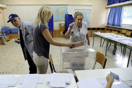 People vote in a general election at a polling station in Athens, Greece, September 20, 2015. PHOTO BY REUTERS/Michalis Karagiannis