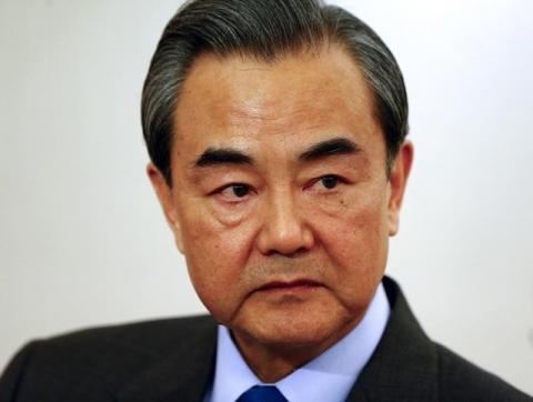 China's Foreign Minister Wang Yi answers reporter's questions during a Reuters interview in Munich, Germany, February 12, 2016. PHOTO BY REUTERS/Michael Dalder