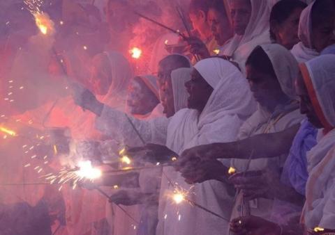 Widows, who have been abandoned by their families, light sparklers after offering prayers on the banks of the river Yamuna as part of Diwali celebrations organised by non-governmental organisation Sulabh International in Vrindavan, in the northern state of Uttar Pradesh, India, November 10, 2015. PHOTO BY REUTERS/K. K. Arora