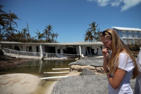 A local resident reacts as she sees the damage on her home after Hurricane Irma struck Florida, in Islamorada Key, U.S., September 12, 2017. PHOTO BY REUTERS/Carlos Barria