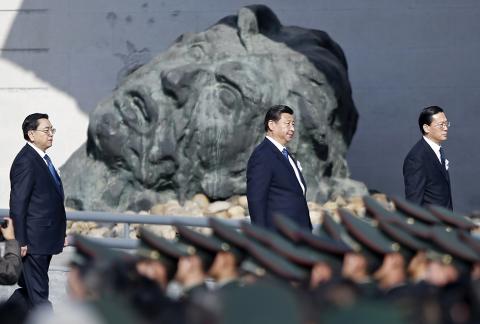 Chinese President Xi Jinping (C) and other leaders attend a memorial ceremony at the Nanjing Massacre Museum in Nanjing, Jiangsu province, December 13, 2014. PHOTO BY REUTERS/Aly Song