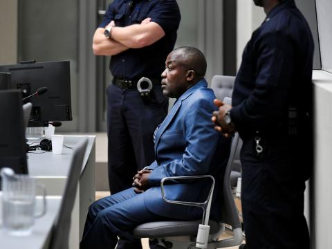 War crimes suspect Alfred Yekatom, wanted for alleged murder, deportation and torture of Muslims in the Central African Republic, appears before the International Criminal Court in The Hague, Netherlands, November 23, 2018. PHOTO BY REUTERS/Piroschka van de Wouw