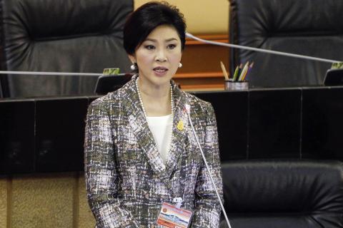 Ousted former Prime Minister Yingluck Shinawatra delivers her statement at the National Legislative Assembly meeting in Bangkok, January 22, 2015. PHOTO BY REUTERS/Chaiwat Subprasom